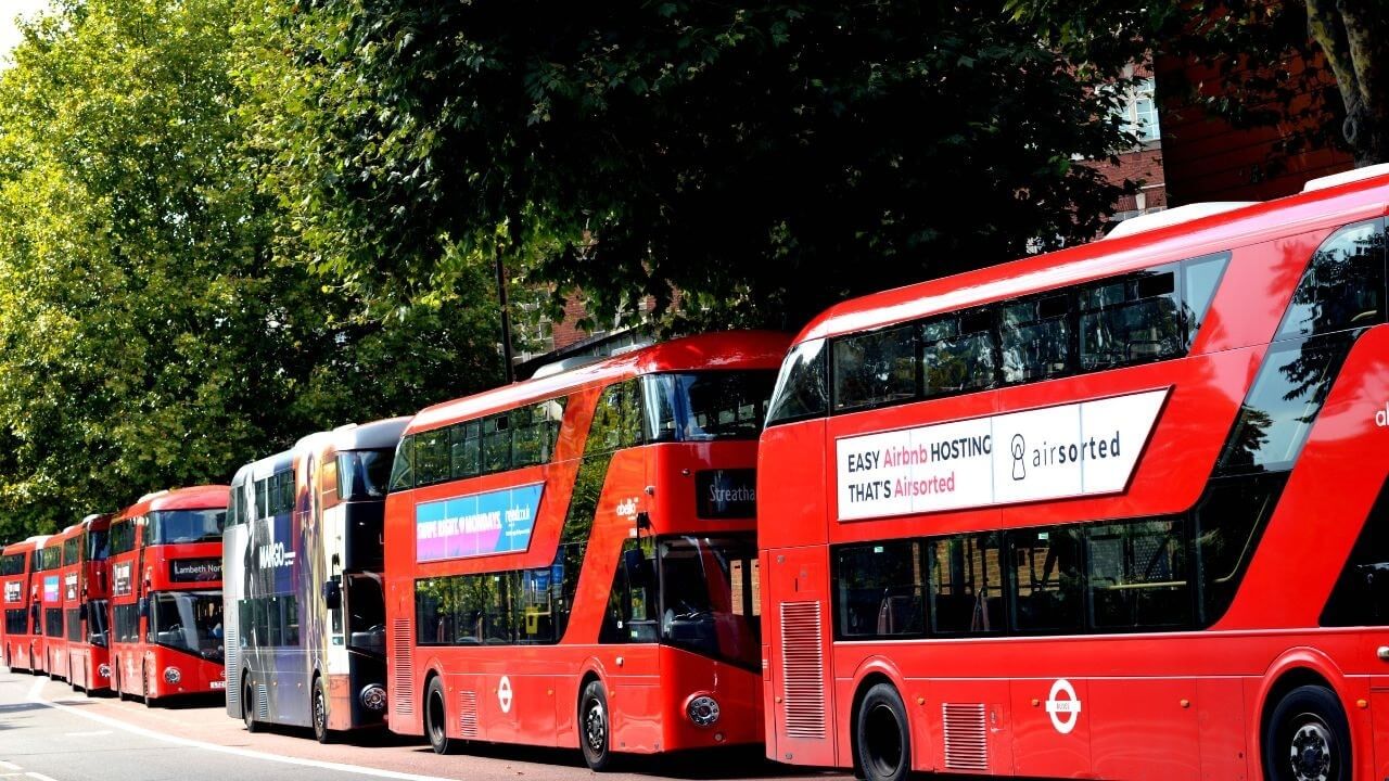 Public shuttle bus services from the main terminal showcasing one of the common types of buses in the city.